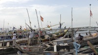 a group of boats in the water